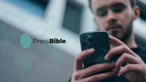 Man on iPhone with the PressBible App